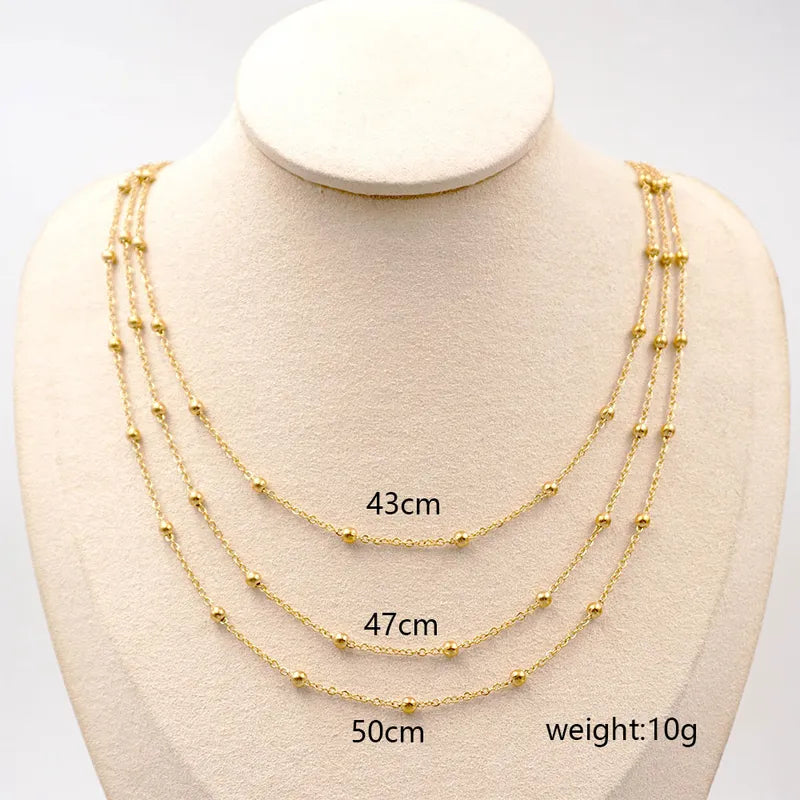 Golden Three Strand Ball Necklace